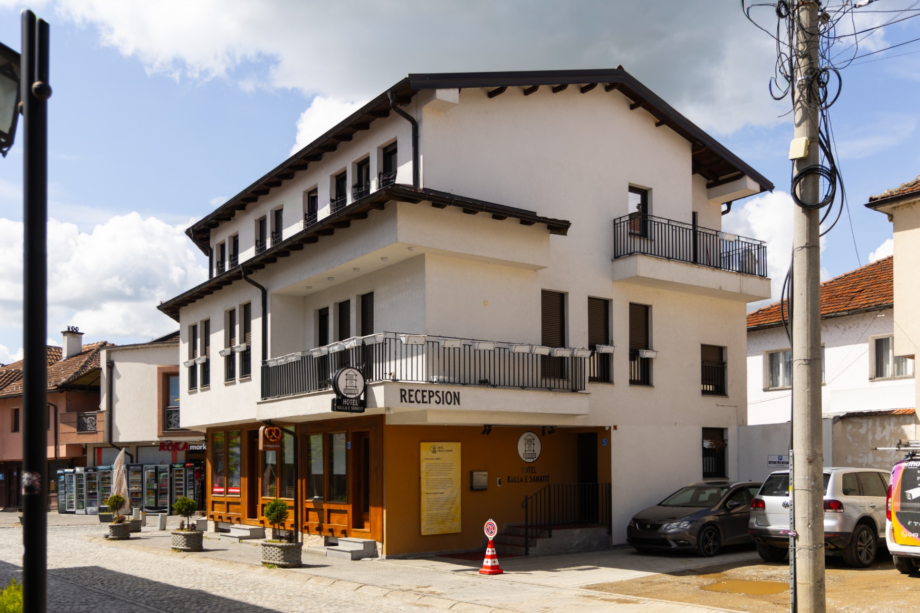 Hotel Kulla e Sahatit facade with reception entrance